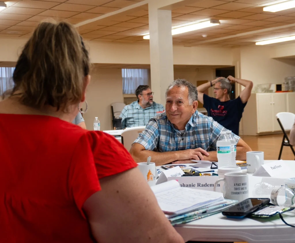 Attendees collaborate with one another to develop strategies to best reach the fathers in their communities on Wednesday, July 17.