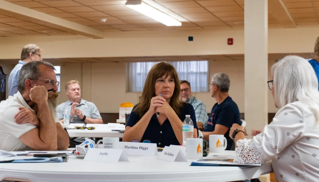 Attendees collaborate with one another to develop strategies to best reach the fathers in their communities on Wednesday, July 17.