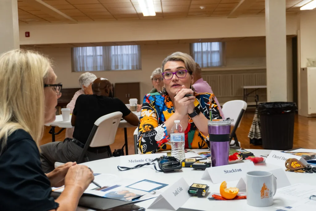 Attendees collaborate with one another to develop strategies to best reach the fathers in their communities on Wednesday, July 17.