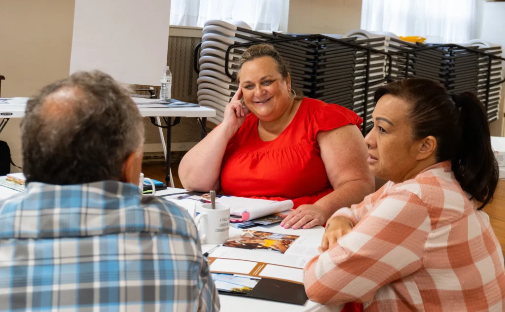 Attendees collaborate with one another to develop strategies to best reach the fathers in their communities on Wednesday, July 17.