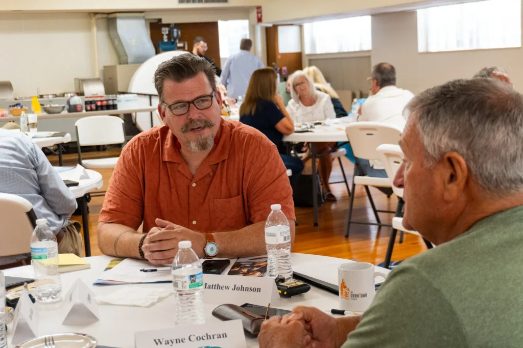 Attendees collaborate with one another to develop strategies to best reach the fathers in their communities on Wednesday, July 17.