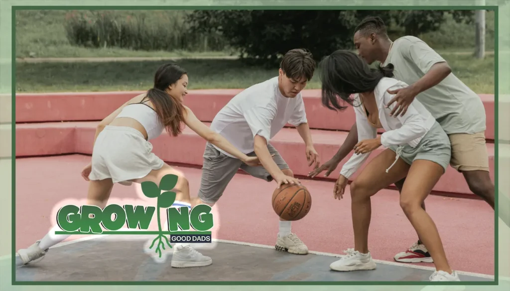 Four happy teenagers play sports with a basketball outside.