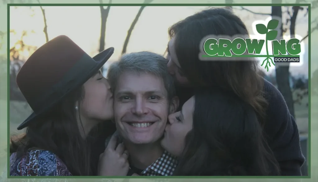 Deron Smith smiles in a family portrait with his three daughters. As a dad, he thinks listening to his children is important