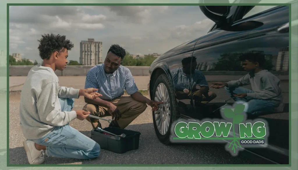 A dad demonstrates to his son how to change a tire.