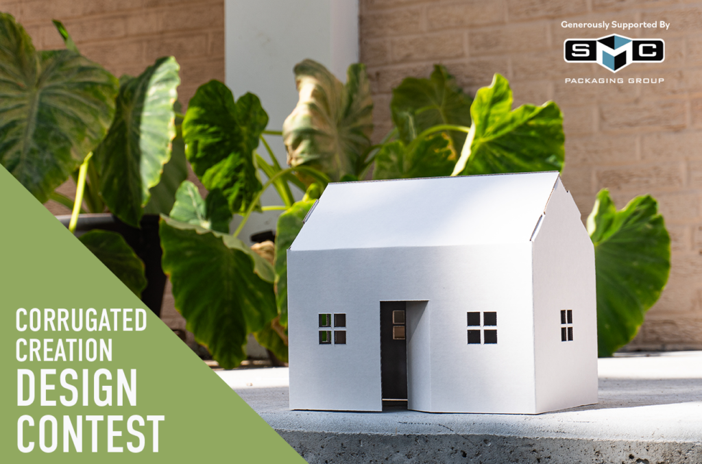 A white corrugated cardboard house against a green background