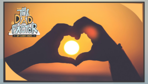 The Dad Factor: Hands forming a heart, framing a sunset