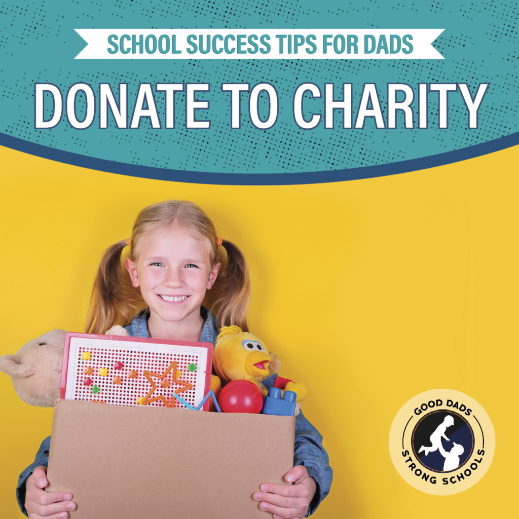 School Success Tips for Dads: donate to charity - a happy young girl with pigtails holds a large cardboard box overflowing with children's toys.