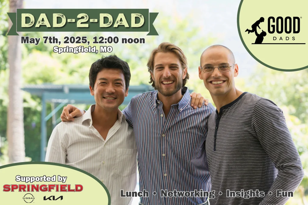 Three young men in business casual attire smile with their arms around each other.