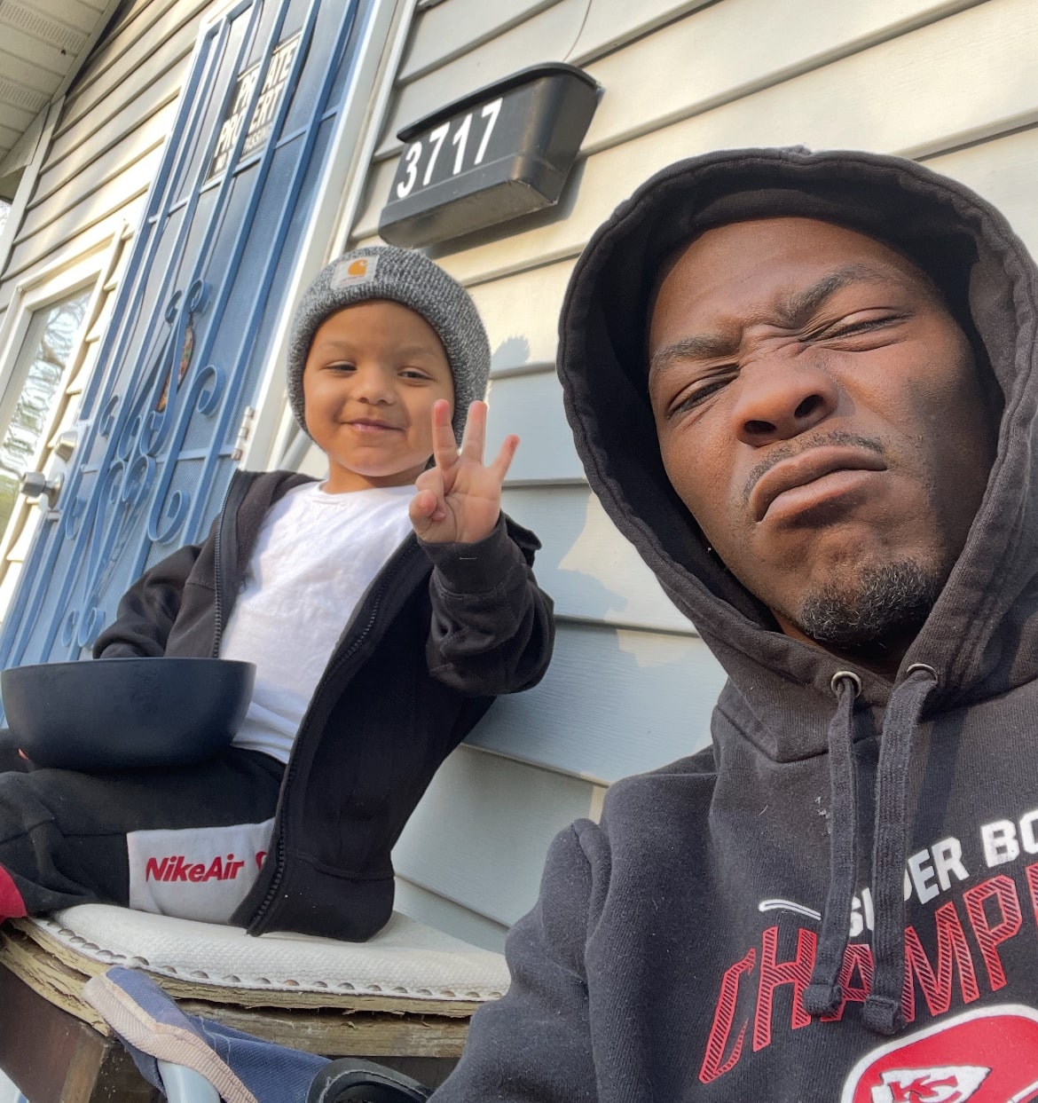 Andre Adams with son