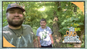The Dad Factor: Dyllan Dale with his son surrounded by greenery.