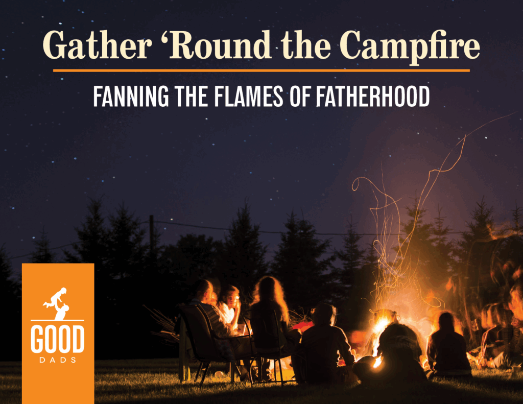 A nighttime image of a group of silhouetted people gathered around a bright campfire against a dark sky. Text on the image reads: "Gather 'Round the Campfire - Fanning the Flames of Fatherhood"