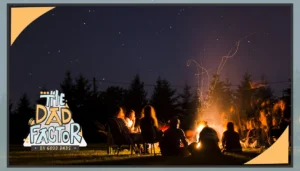 The Dad Factor: A family sits around a campfire at night under the stars