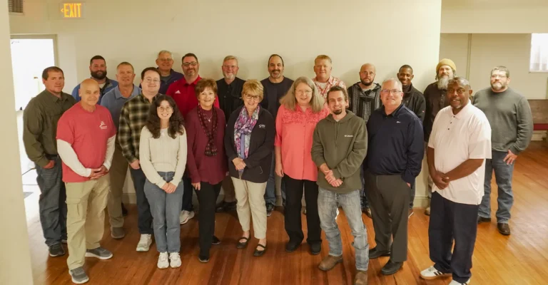 A group photo of approximately 20 people who attended Good Dads 2.0 training in November 2025.