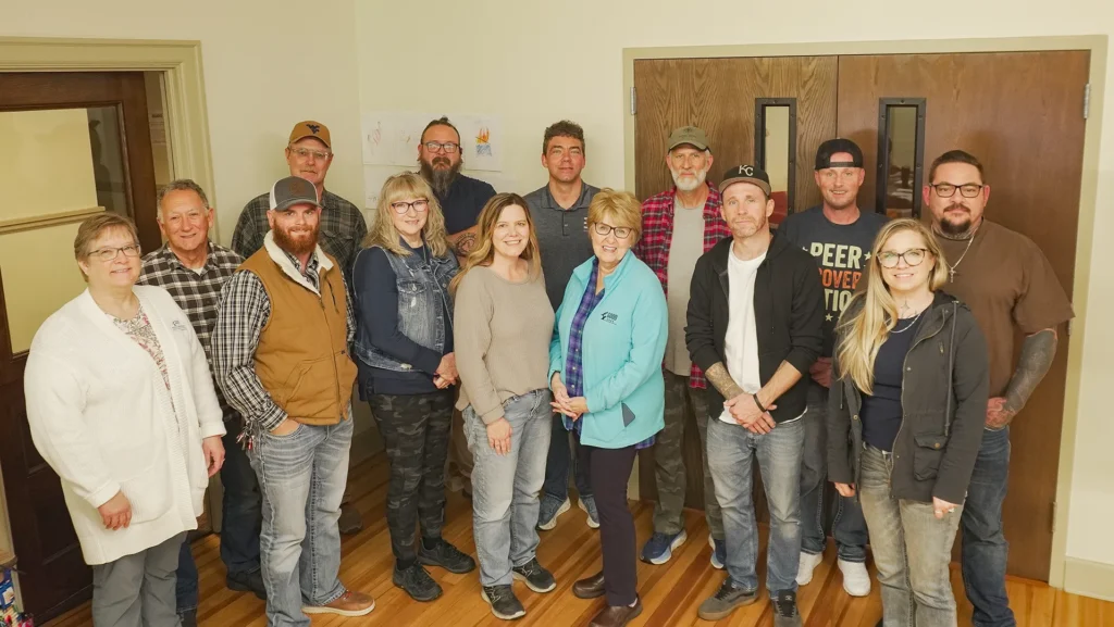 A group photo of approximately 15 people who attended Good Dads 2.0 training in November 2025.