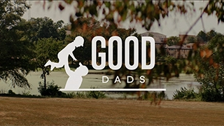 The Good Dads logo superimposed on top of a beautiful park setting
