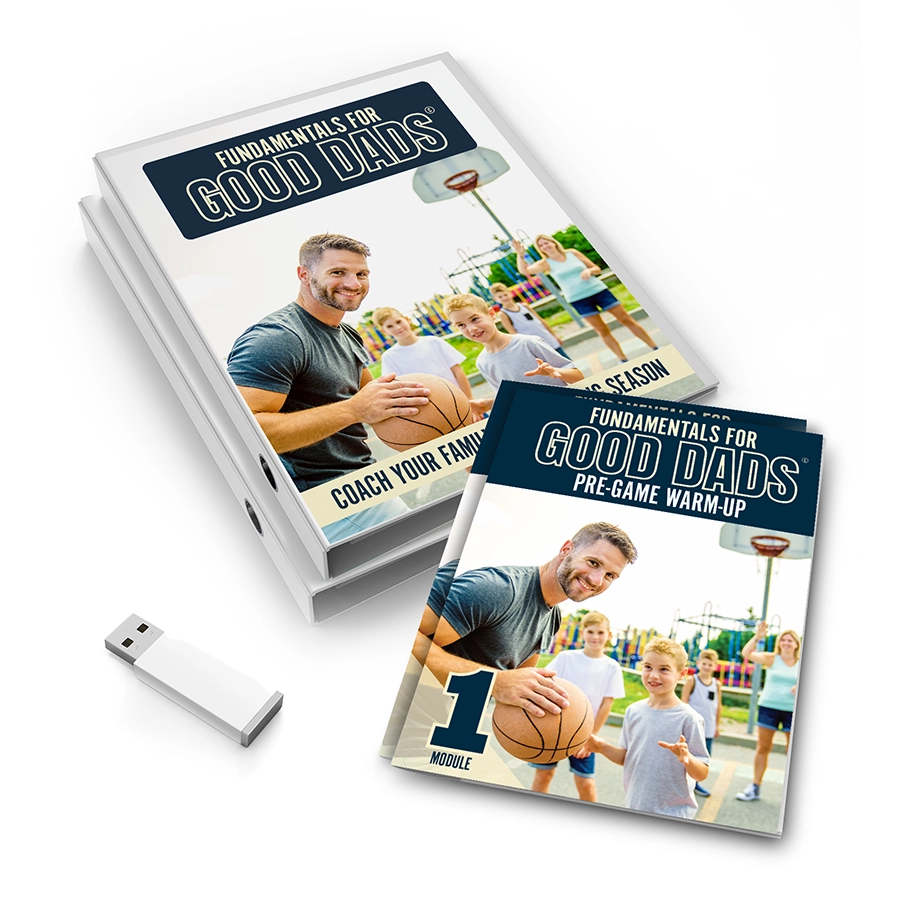A stack of paper modules for Fundamentals for Good Dads, fanned out on a white background, a flash drive sitting next to them.