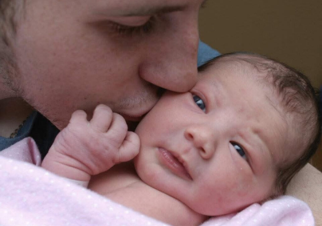 Adam Halliday with baby