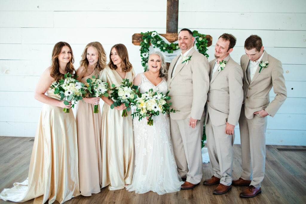 Bobby Mitchell at wedding with bridesmaids and groomsmen.