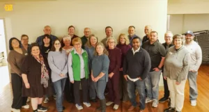 Members of Good Dads staff, facilitators and chapter advisory boards gather for a group phot on Friday, February 20 at Good Dads' chapter orientation.