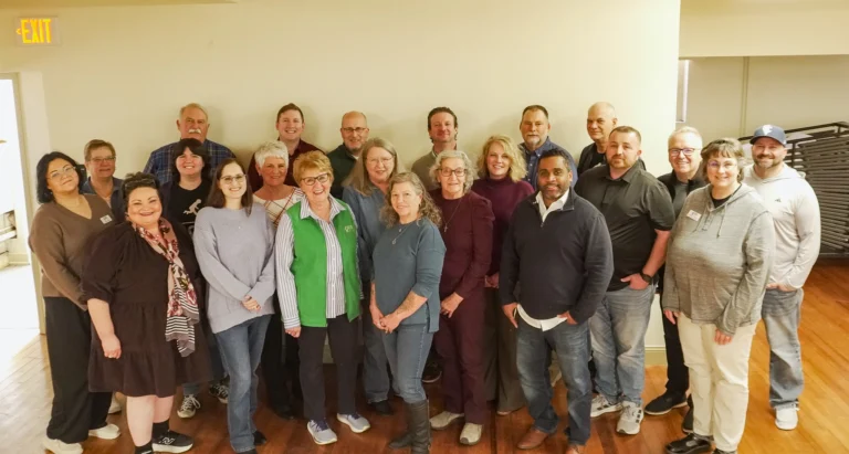 Members of Good Dads staff, facilitators and chapter advisory boards gather for a group phot on Friday, February 20 at Good Dads' chapter orientation.