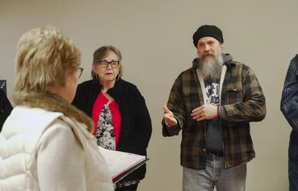 Facilitators engage in a group discussion during an activity at the January 2026 Good Dads Plus Us Training Camp in Springfield MO.