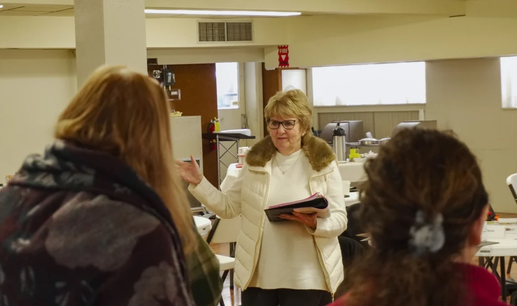 Good Dads founder and director Dr. Jennifer L. Baker, addresses the room of facilitators at the January 2026 Good Dads Plus Us Training Camp in Springfield MO.