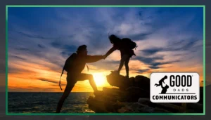 Good Dads Communicators: A sunset in the background, an outline of two figures, one on a higher level, helping the other figure up