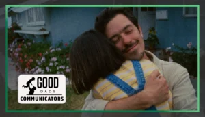 Good Dads Communicators: a smiling father embraces his young daughter