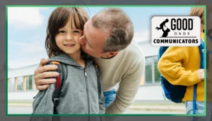 Good Dads Communicators: A father kisses his smiling daughter on the cheek